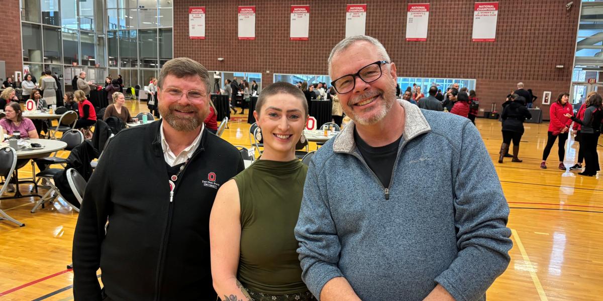 three people together smiling